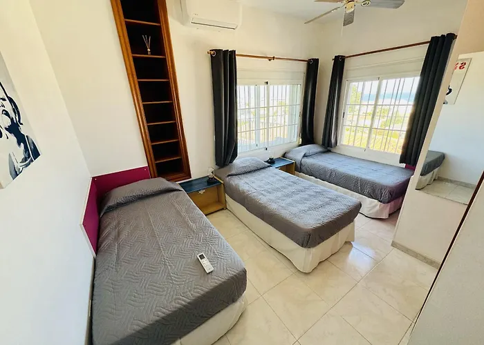 Carmina Villa *